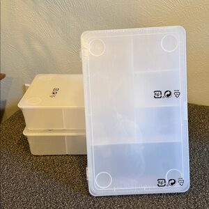 A pack of 3 White Compartment Storage Box New
 Never used.